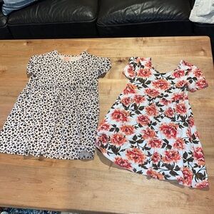2 size 8 short sleeve cotton dresses  both with pockets guc